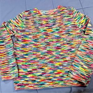 Cozy multi colored knit sweater. Brand new! Never been worn.